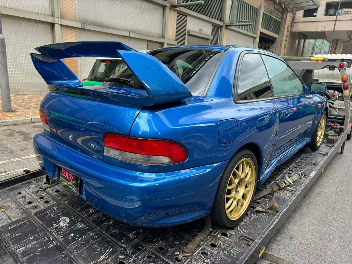 Two rare Subaru Impreza STI vehicles prepared for container shipping from Hong Kong to Poland