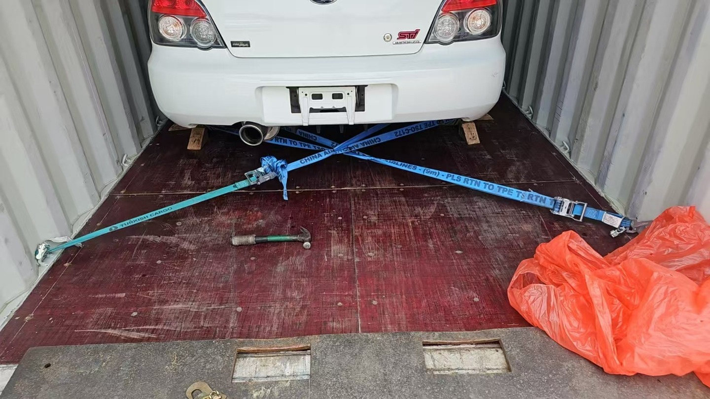 Subaru Impreza WRX STI Spec-C Type RA secured inside a container before shipment from Hong Kong