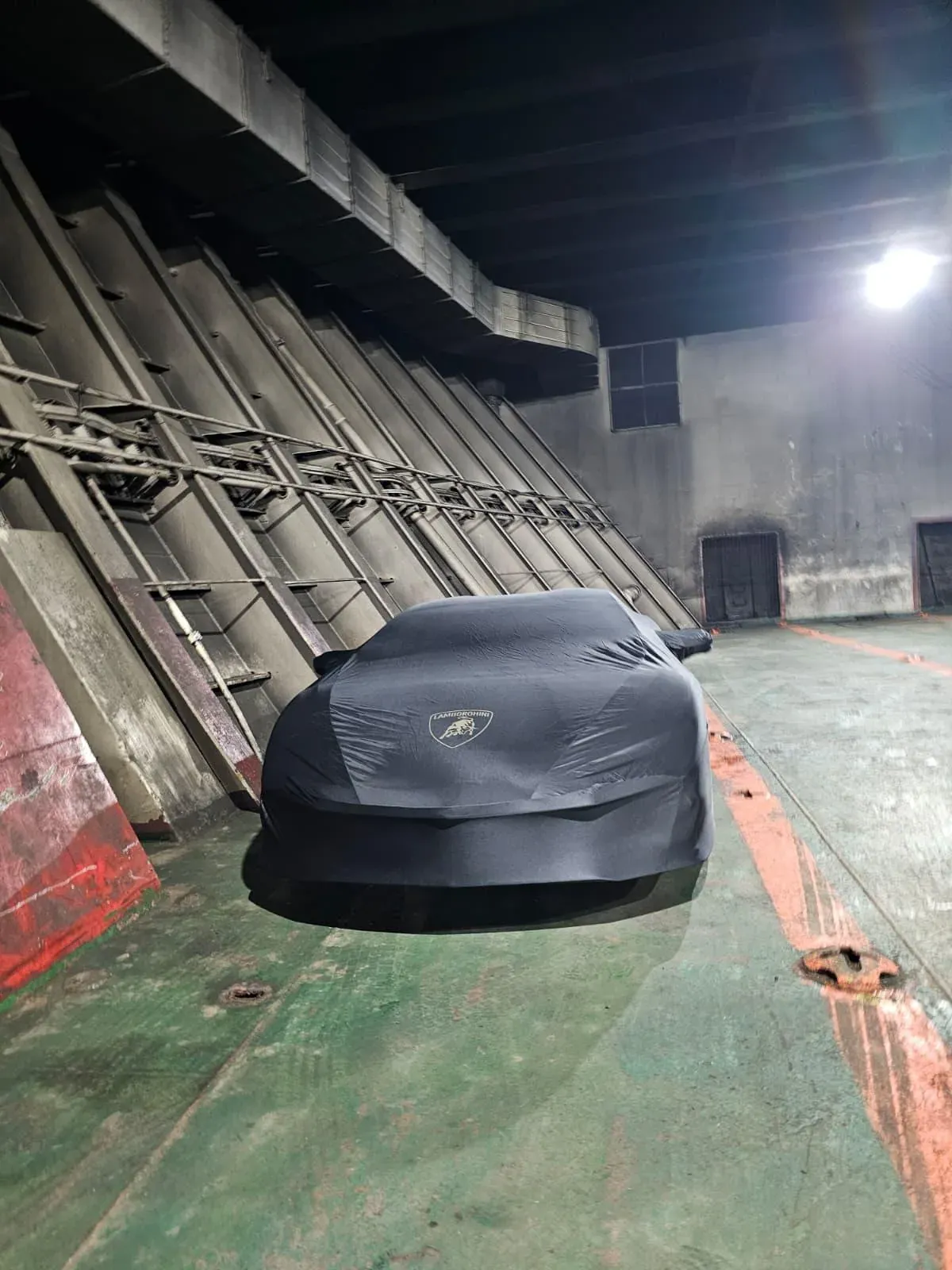 Blue Lamborghini Temerario protected for the sea leg
