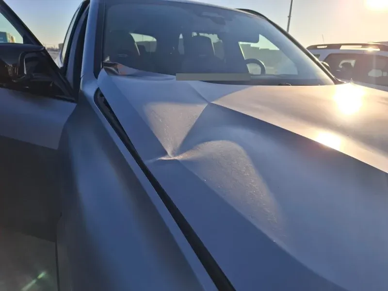 Closer view of the folds in the BMW bonnet from the same Constanta incident